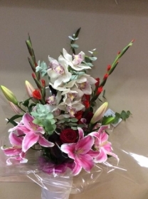 Cymbidium orchid and oriental Lilly bouquet