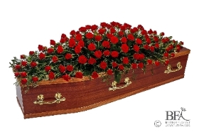 Red roses casket spray